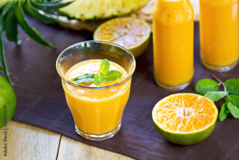 Fototapeta premium Pineapple with Orange and Mango smoothie