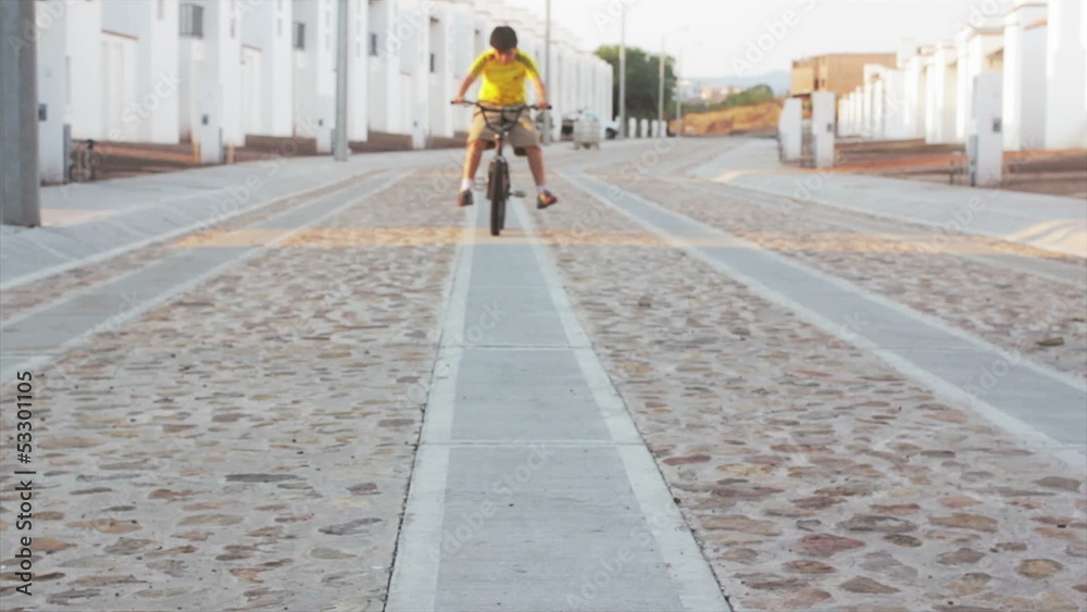 Boy practicing bicycle Boy practicing bicycle