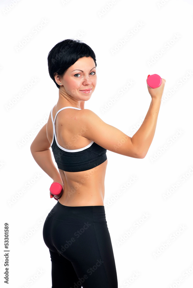 Portrait of young fitness woman with a dumbbells Portrait of young fitness woman with a dumbbells