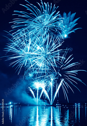 Blue firework in a night sky