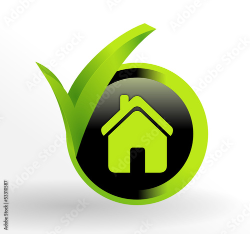 maison sur bouton vert et noir