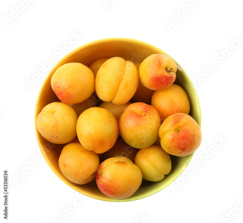 fresh apricot on a bowl