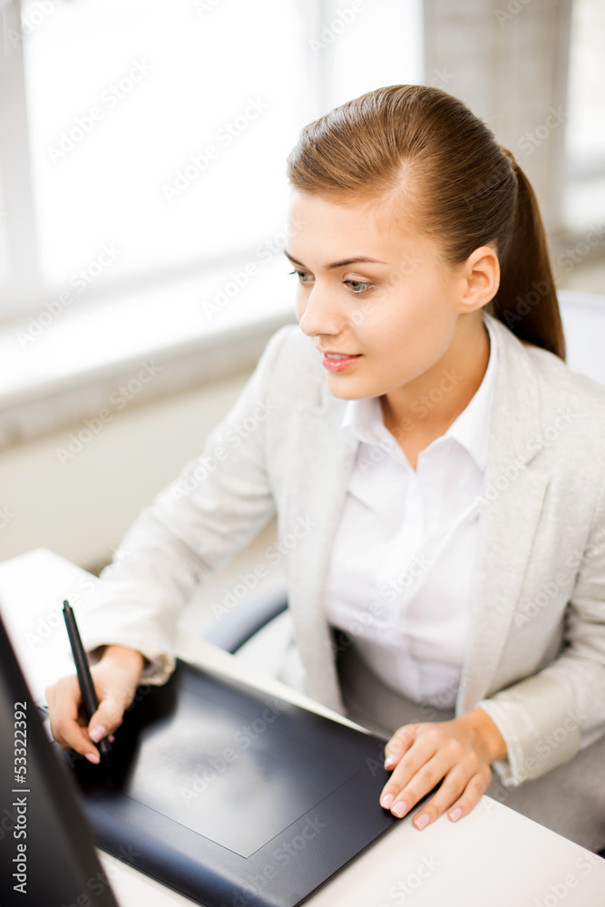 businesswoman with drawing tablet in office businesswoman with drawing tablet in office