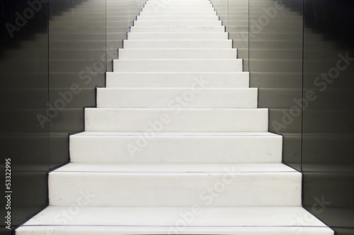 Concrete stairs with black wall