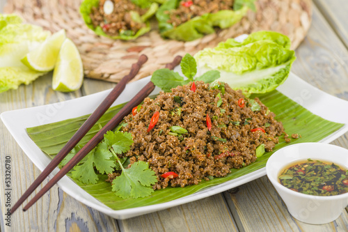 Larb - Lao minced beef salad with ground toasted rice. photo