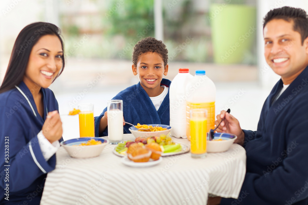 happy indian fmaily having breakfast happy indian fmaily having breakfast