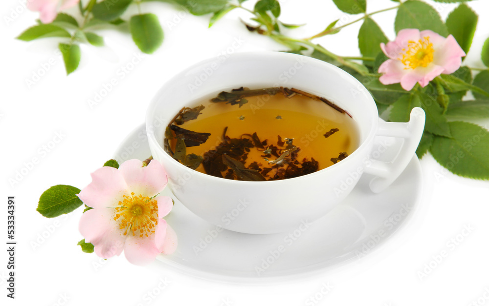 Cup of herbal tea with hip rose flowers, isolated on white Cup of herbal tea with hip rose flowers, isolated on white