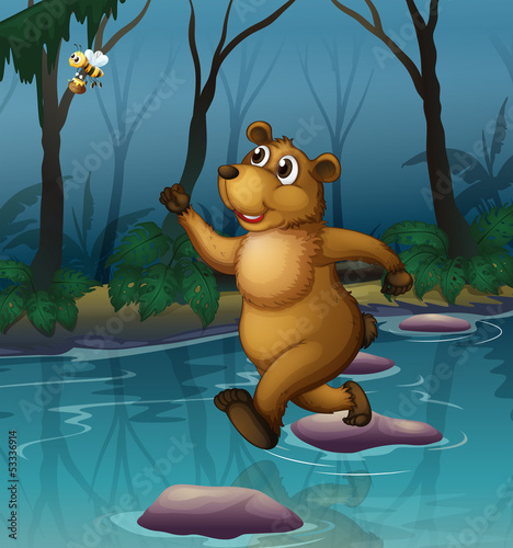 A bear and a bee at the forest