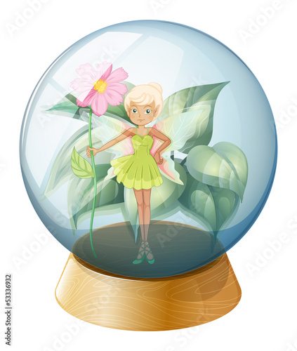 A fairy holding a flower inside the crystal ball