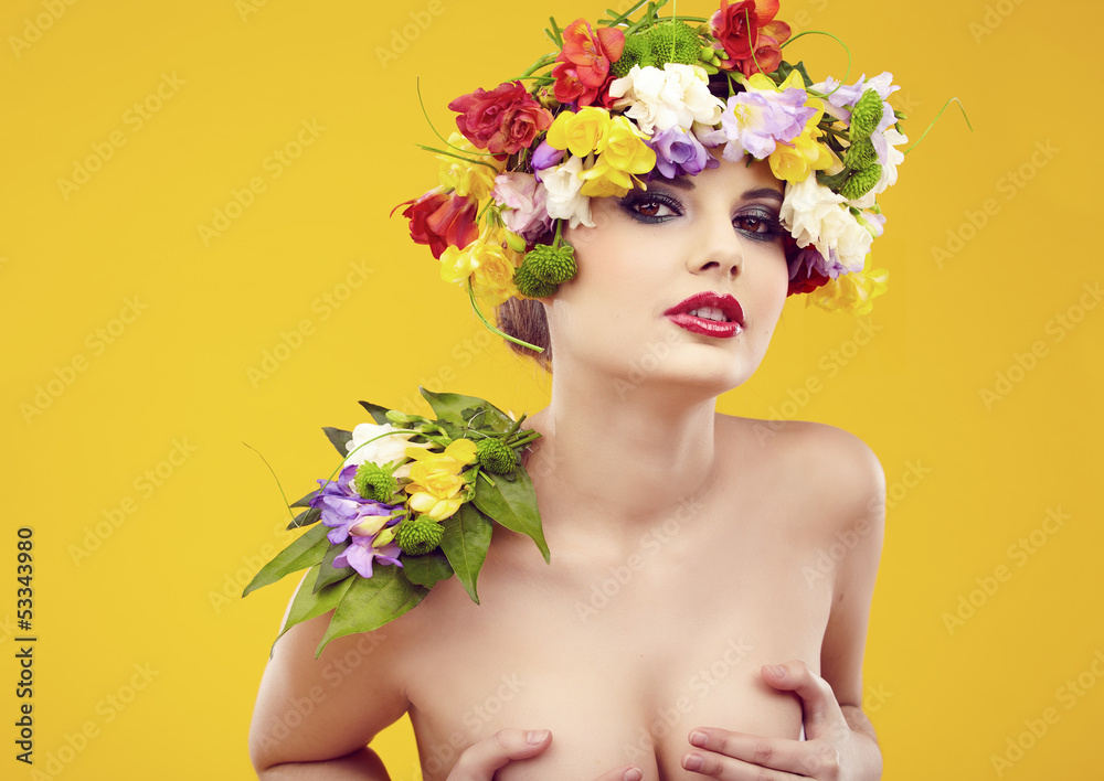 Summer young woman with colorful flowers in hair. Summer young woman with colorful flowers in hair.