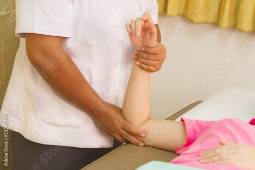 Physiotherapist treating biceps muscle  Rehabitation  for muscle