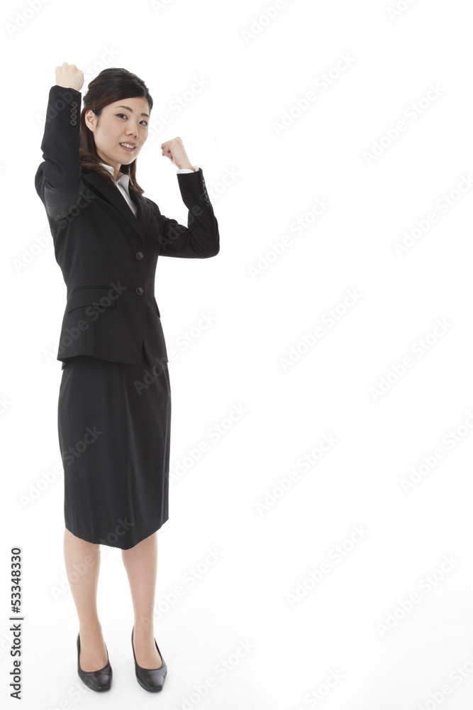young business woman doing a guts pose young business woman doing a guts pose