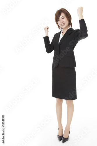 young business woman doing a guts pose