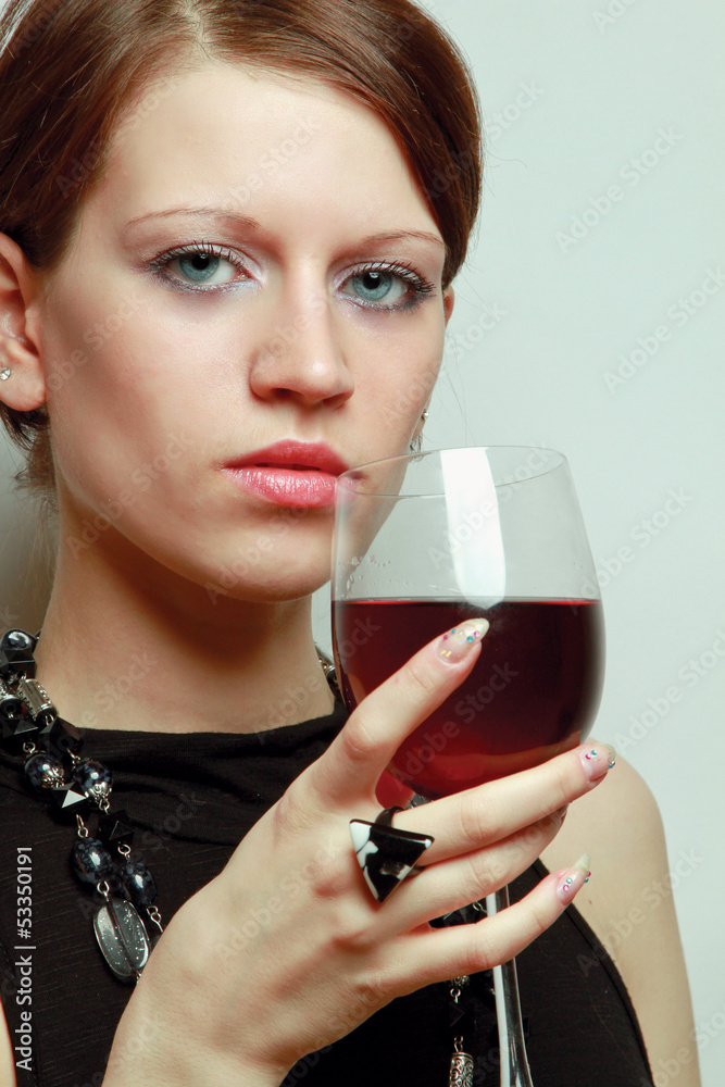 Portrait of a beautiful woman with a wineglass Portrait of a beautiful woman with a wineglass