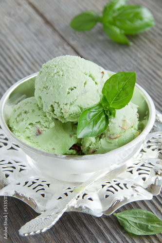 Green ice cream with basil, mint and nuts.