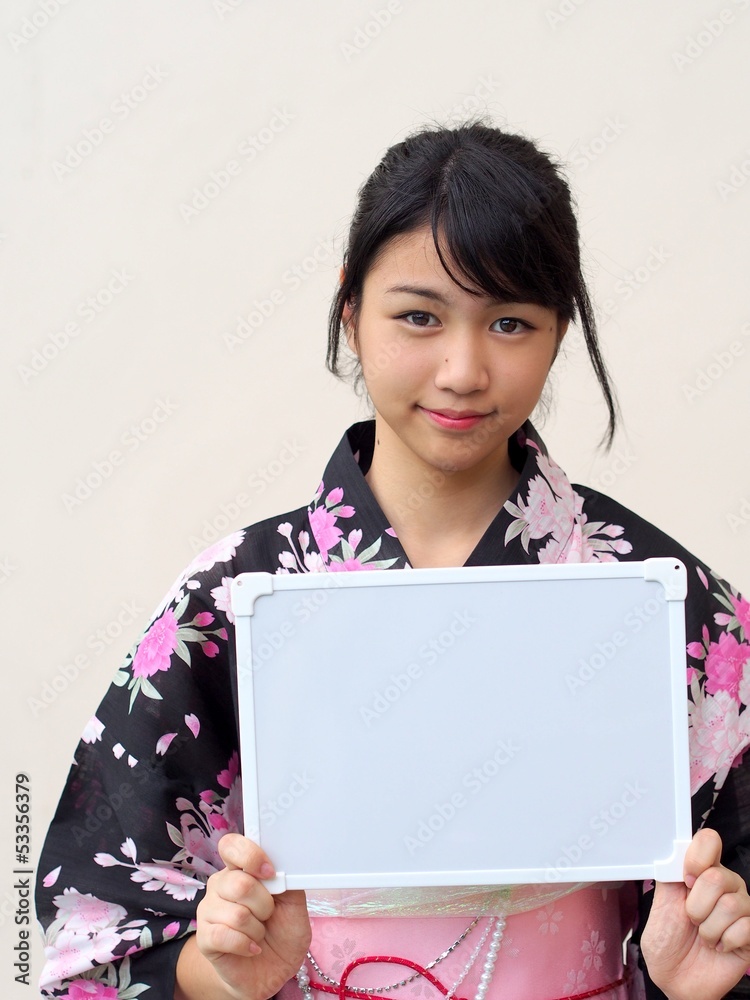 Japanese girl wearing kimono and whiteboard Japanese girl wearing kimono and whiteboard