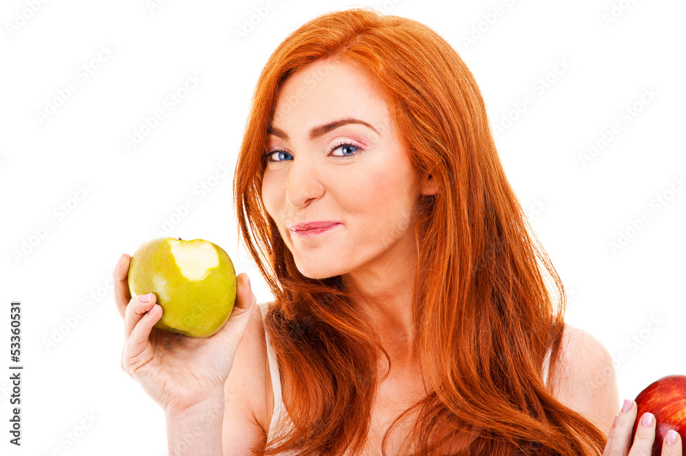 Red hair woman eat green apple on white Red hair woman eat green apple on white