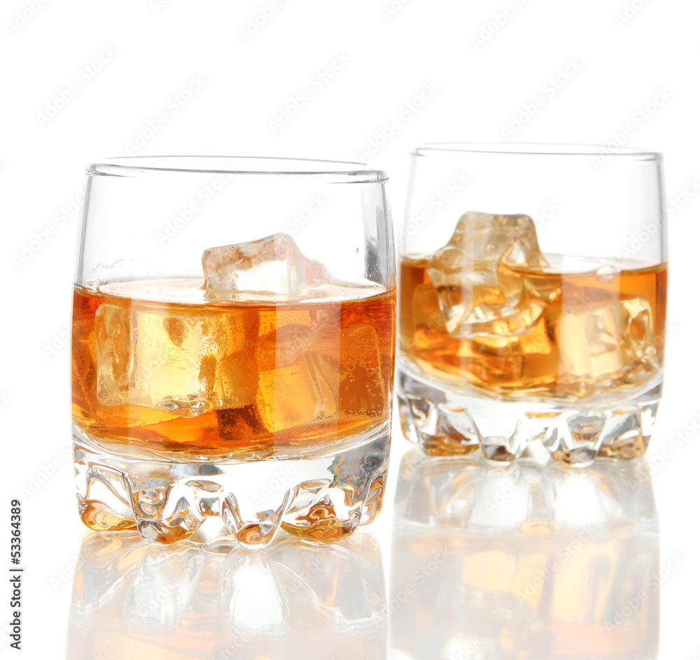 Brandy glasses with ice isolated on white Brandy glasses with ice isolated on white