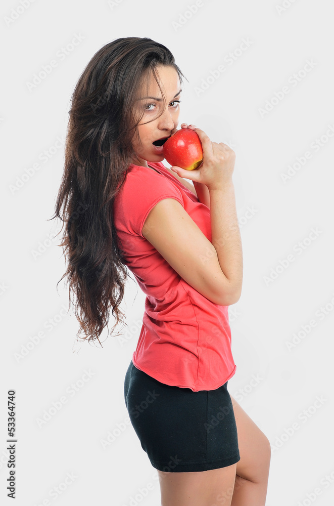Portrait of young woman with apple Portrait of young woman with apple