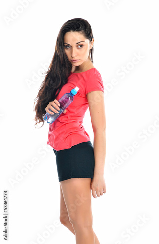 Young fitness woman with a bottle of water © Alona