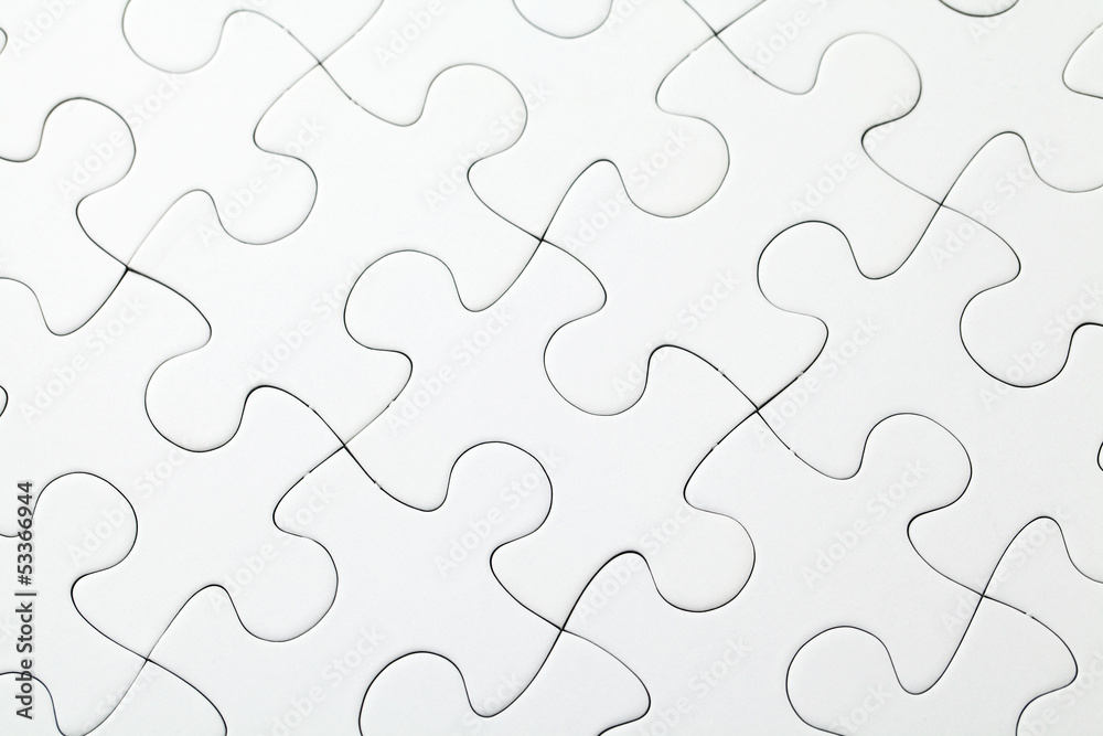 Part of completed white puzzle Part of completed white puzzle