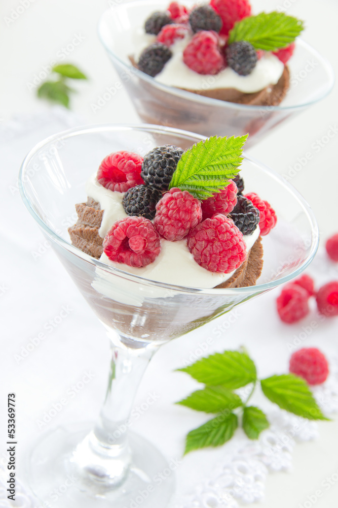 Chocolate mousse with raspberries and cream. Chocolate mousse with raspberries and cream.