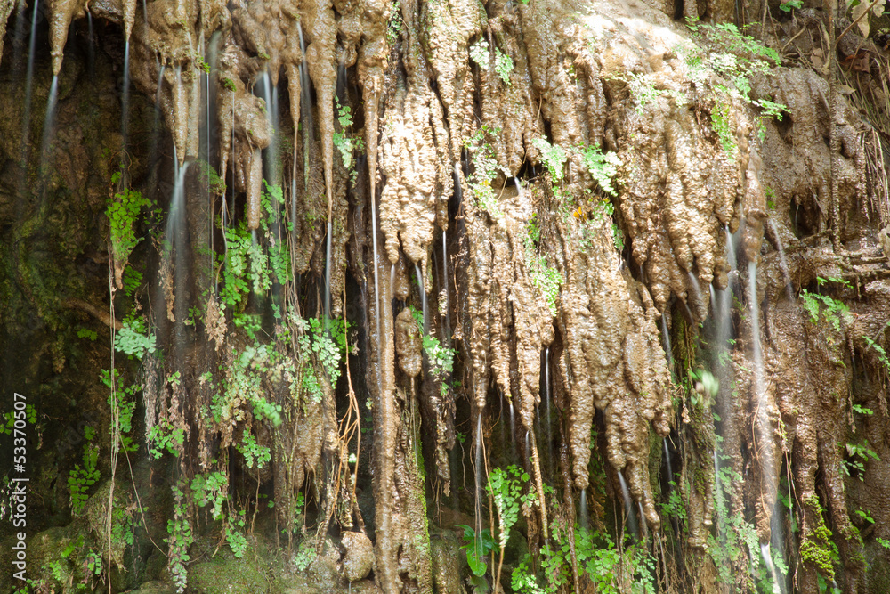 Waterfall that flows over the cliff. Waterfall that flows over the cliff.