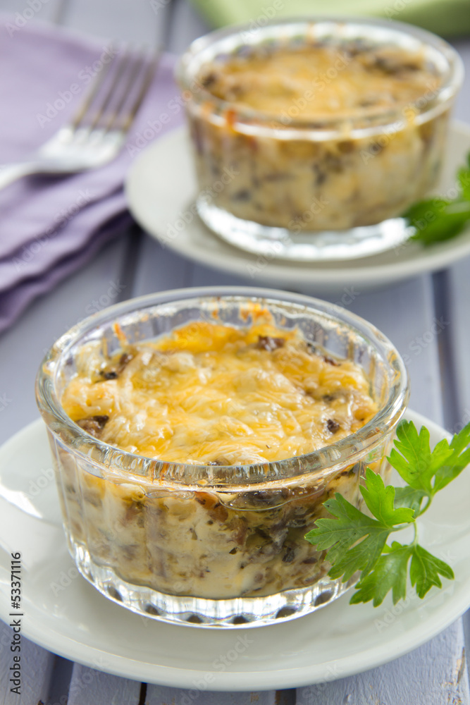 Gratin with mushrooms and cheese. Gratin with mushrooms and cheese.