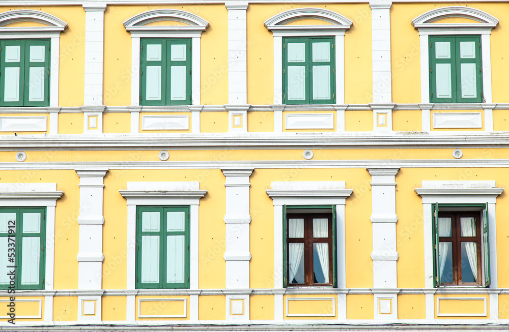 Window with light yellow walls.