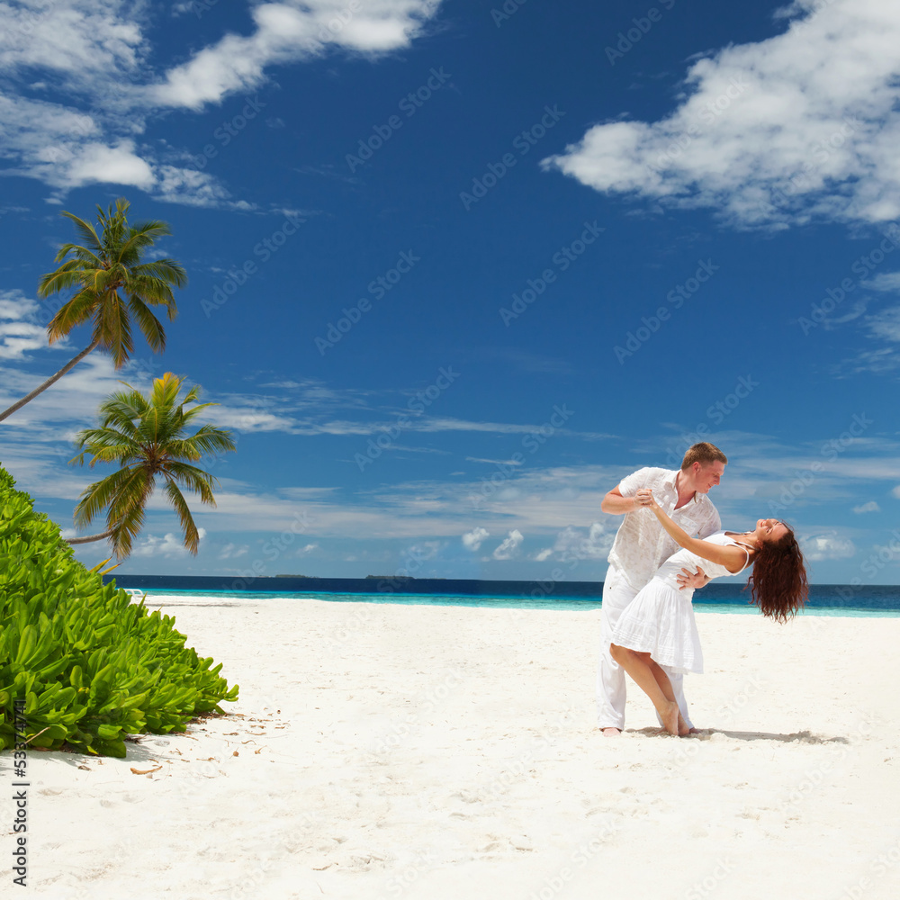 Happy couple on the tropical beach Happy couple on the tropical beach