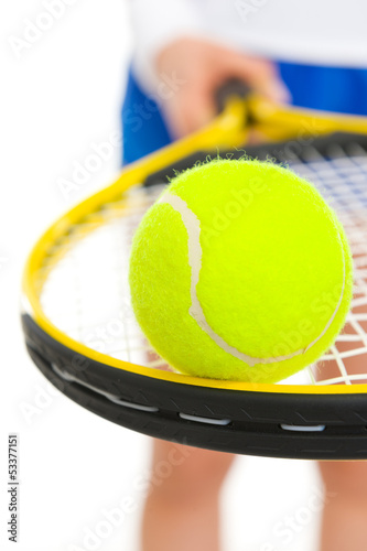 Closeup on tennis ball on racket in hand of tennis player © Alliance
