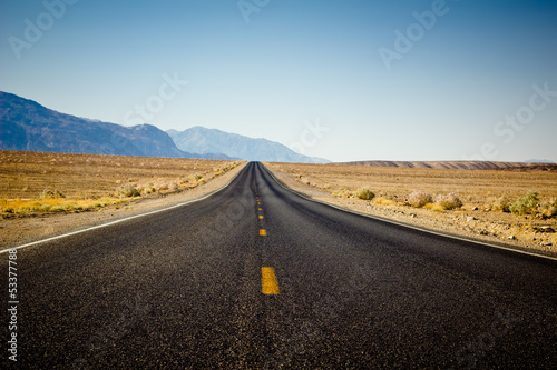 Desolate highway through desert in California