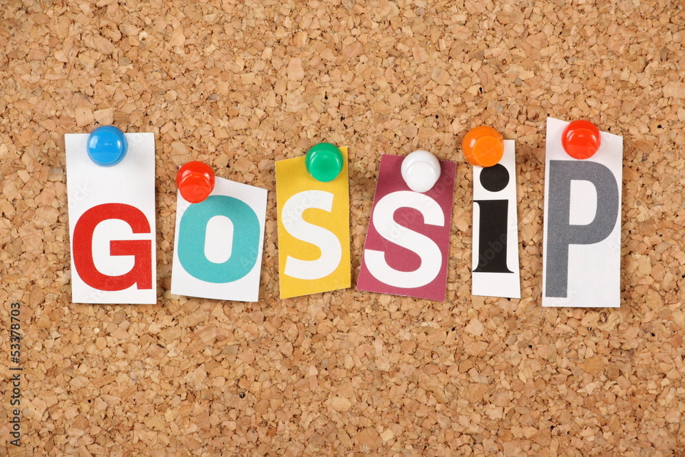 The word Gossip on a cork notice board The word Gossip on a cork notice board