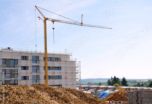 Crane on a construction site houses
