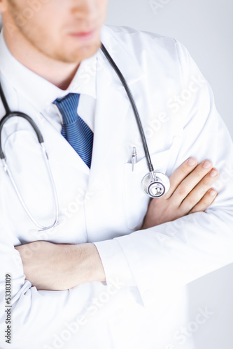 doctor with stethoscope in white uniform