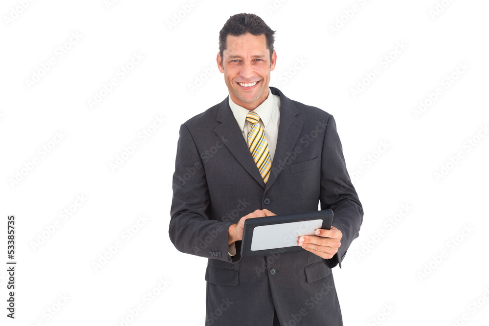 Smiling businessman with pc tablet