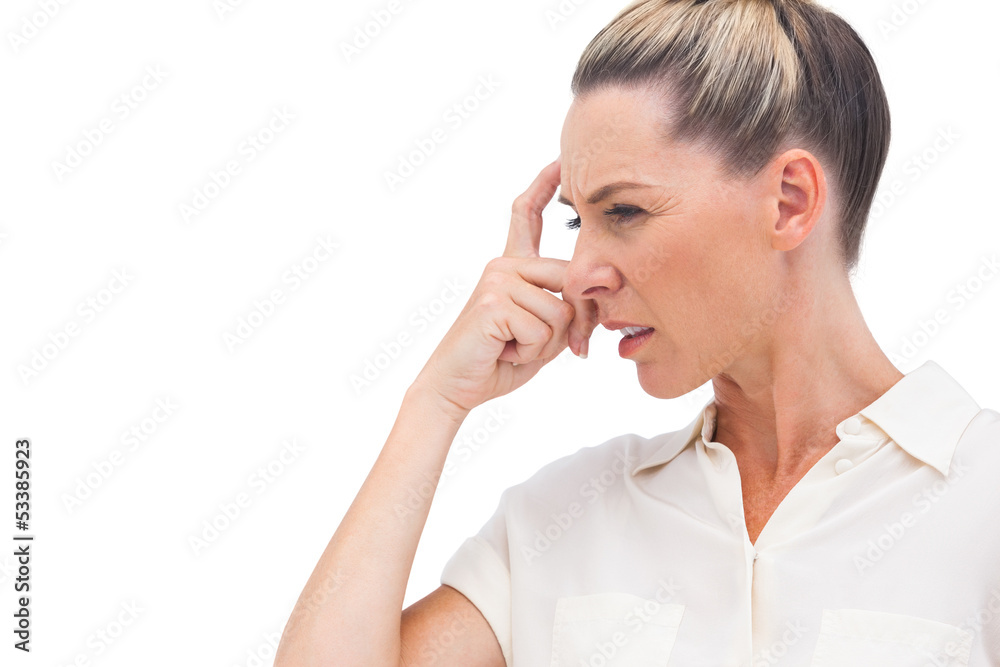 Confused businesswoman with hand on forehead Confused businesswoman with hand on forehead