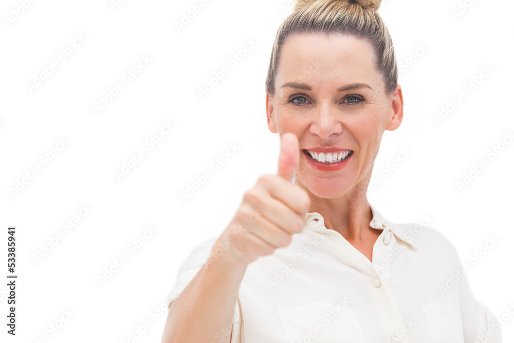 Happy woman smiling with thumb up Happy woman smiling with thumb up