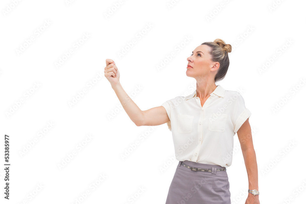 Businesswoman holding her hand and looking up Businesswoman holding her hand and looking up