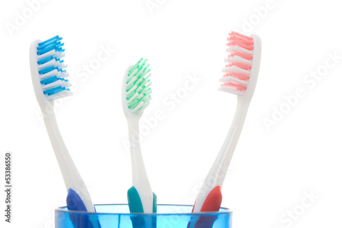 Colorful soft toothbrushes over white