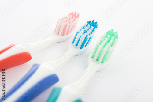 Red, green and blue toothbrush