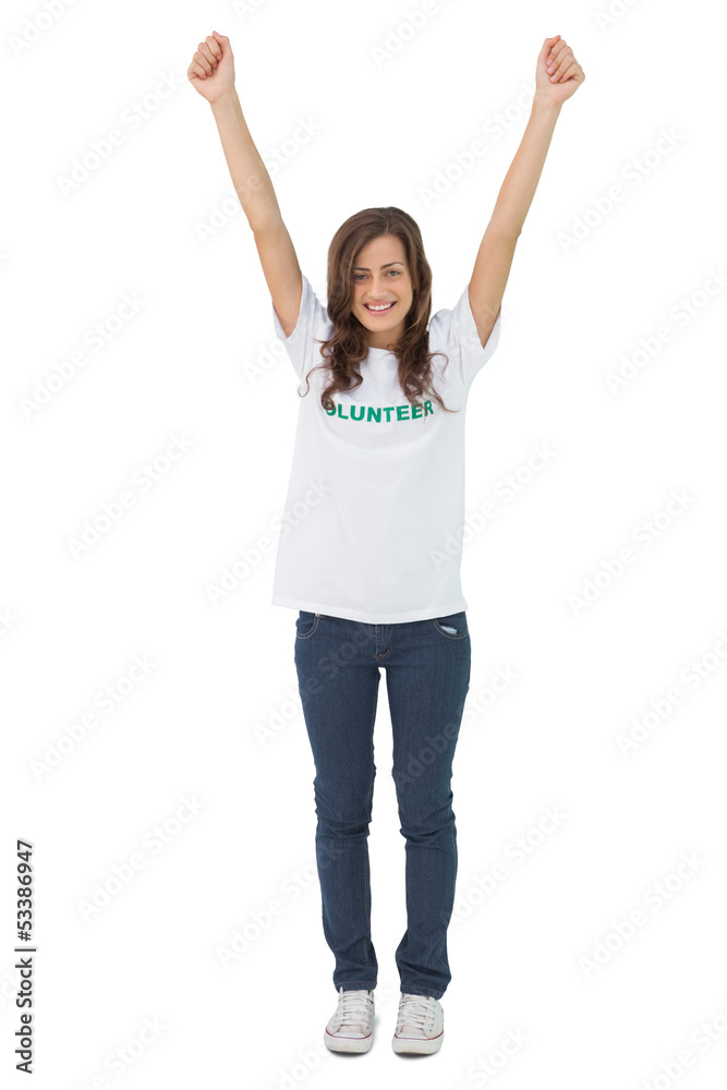 Woman wearing volunteer tshirt raising her arms Woman wearing volunteer tshirt raising her arms