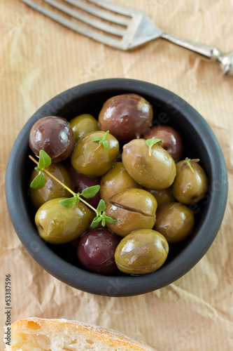 olives in bowl and fork