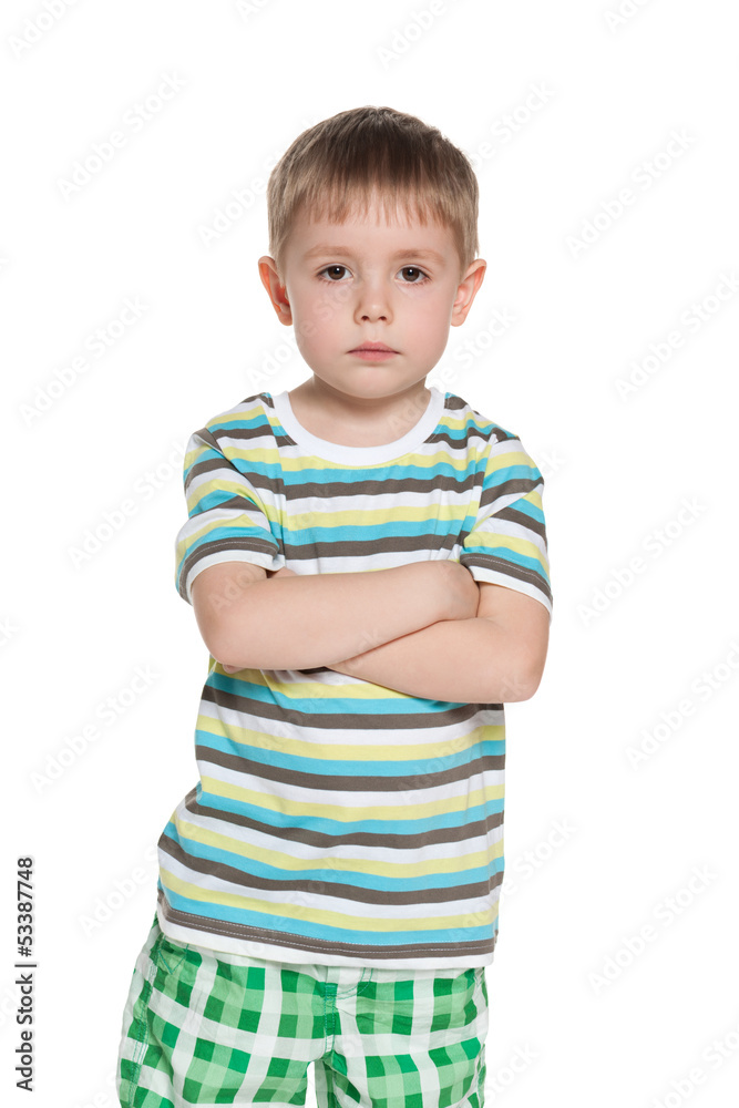 Serious little boy in striped shirt Serious little boy in striped shirt