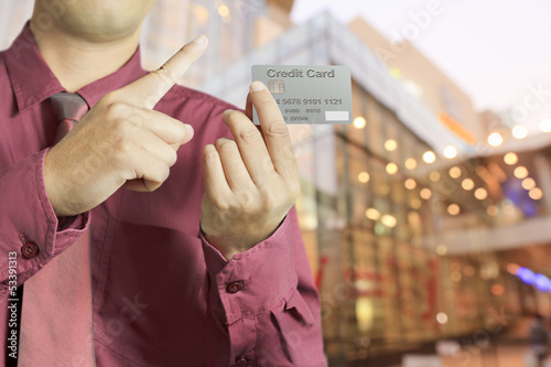 Cropped view of Businessman hand holding credit card