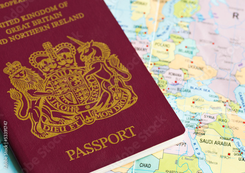 Passport or visa lying on a world map