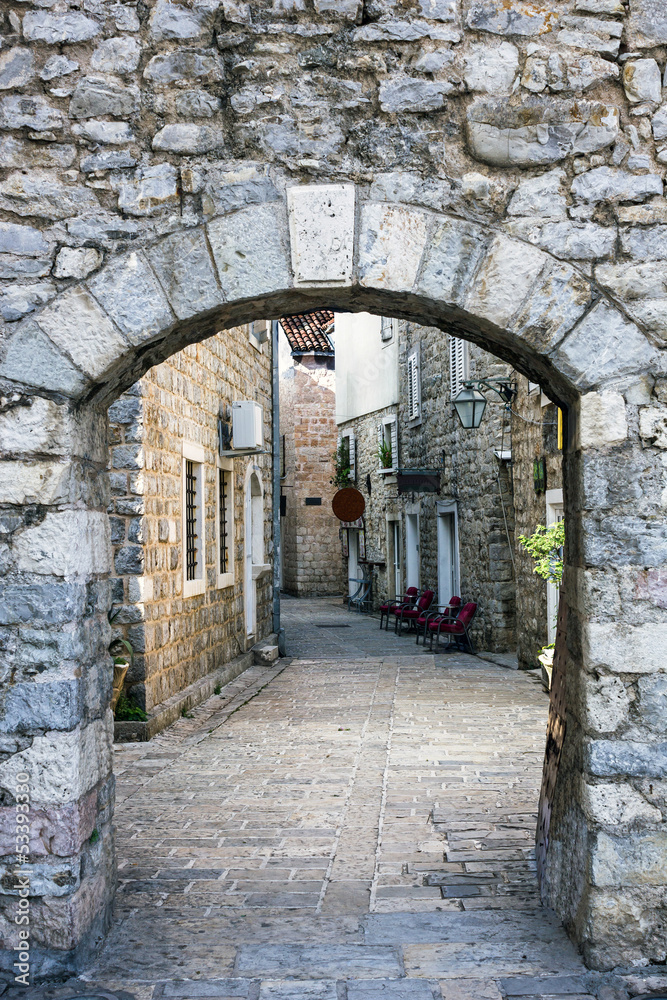 Fototapeta premium Narrow street of old town in Budva, Montenegro.