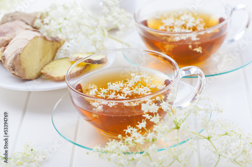 Slika na platnu Cup of elder flower tea with ginger