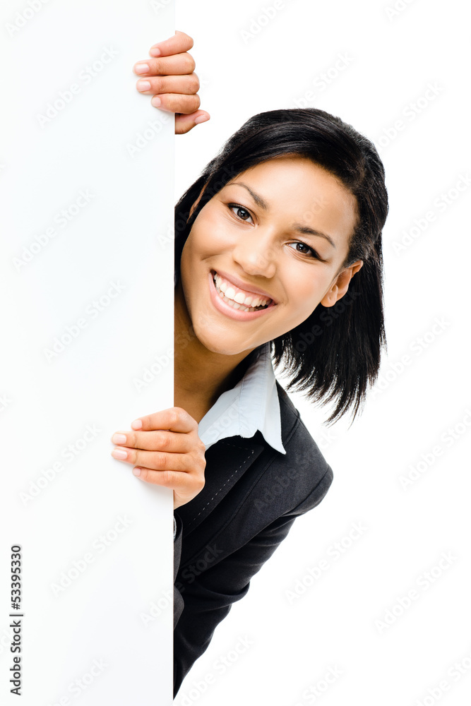 Happy mixed race business woman pointing at empty copy space iso Happy mixed race business woman pointing at empty copy space iso