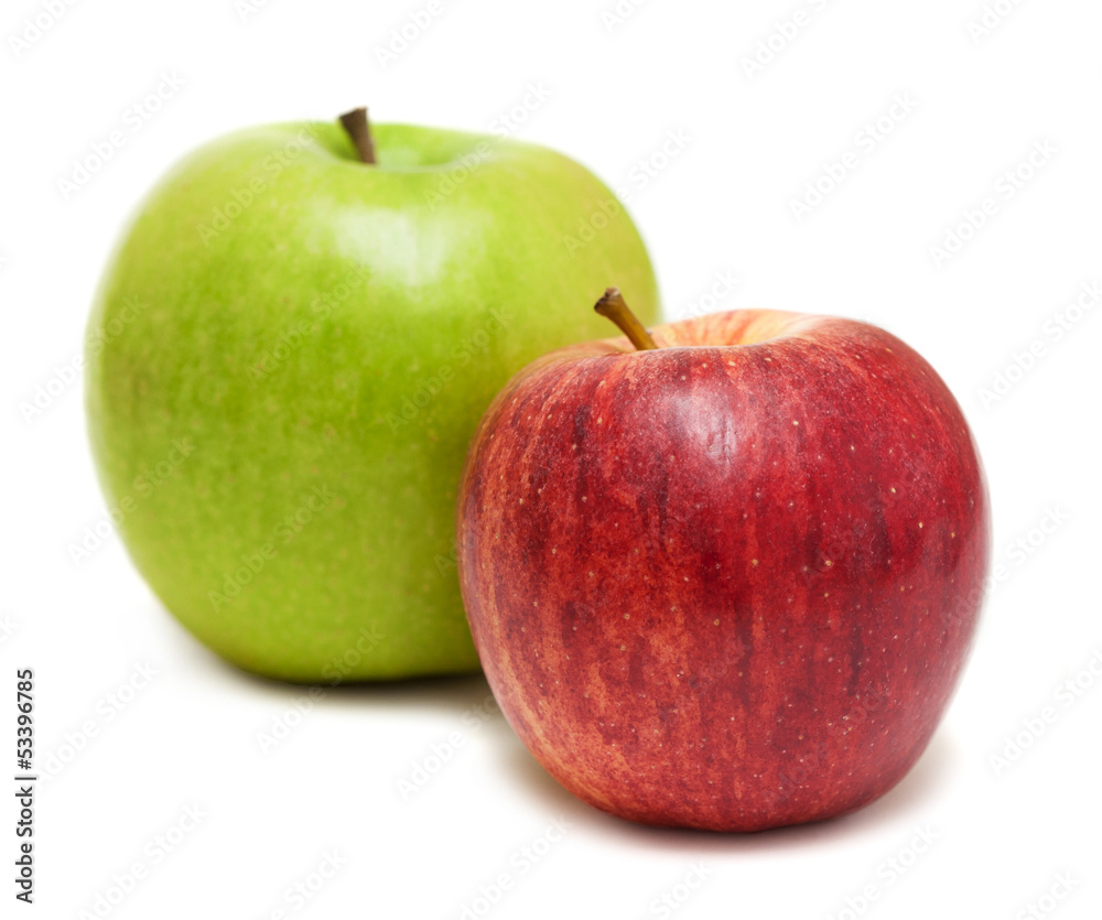 red and green apples over white background red and green apples over white background